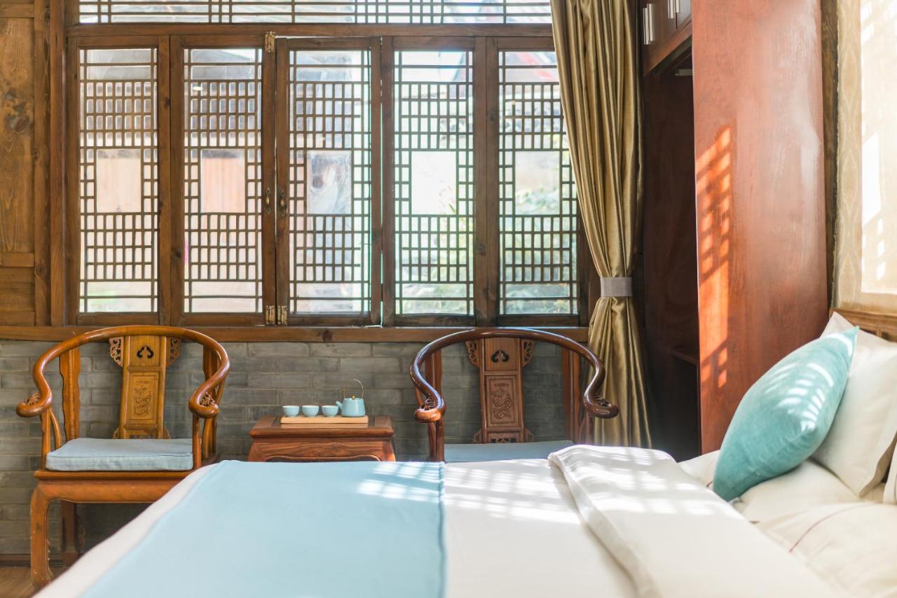 He Mu Ju Inn Zhongyi Branch Lệ Giang Ngoại thất bức ảnh