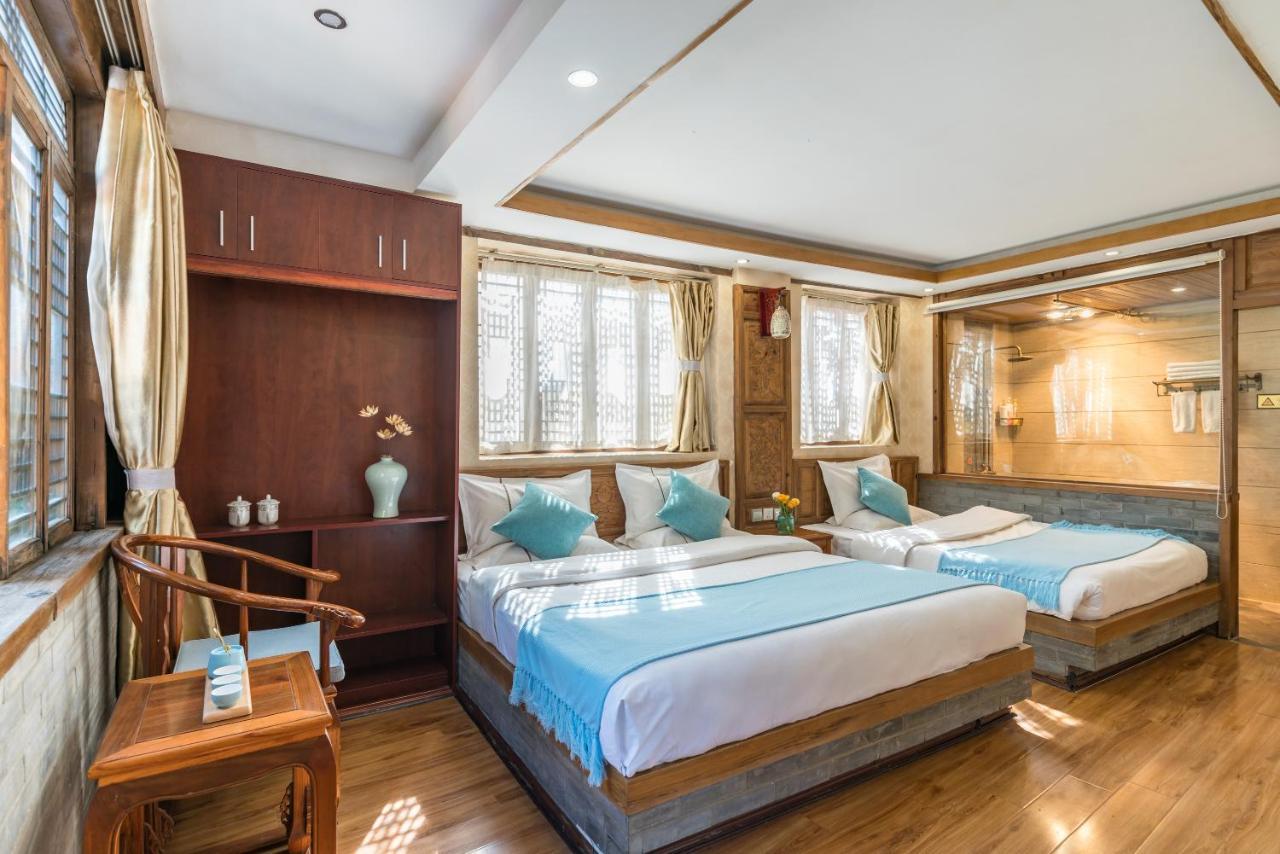 He Mu Ju Inn Zhongyi Branch Lệ Giang Ngoại thất bức ảnh