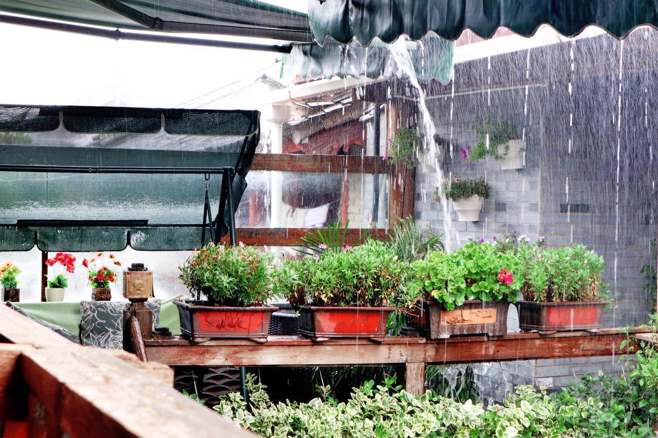 He Mu Ju Inn Zhongyi Branch Lệ Giang Ngoại thất bức ảnh