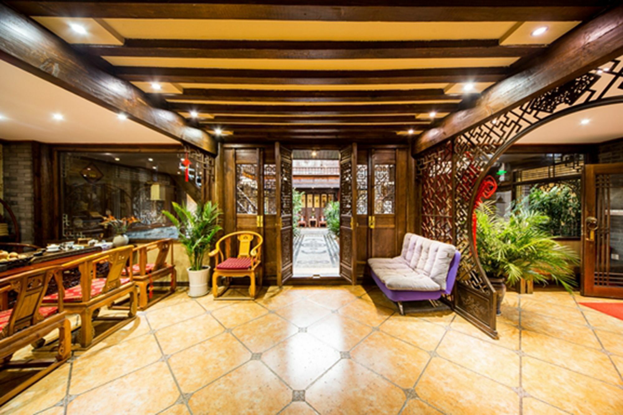He Mu Ju Inn Zhongyi Branch Lệ Giang Ngoại thất bức ảnh