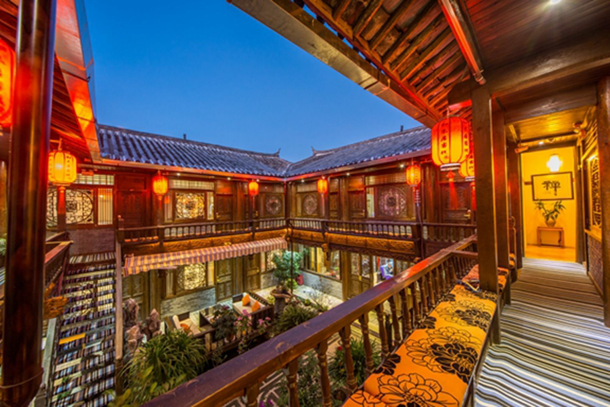 He Mu Ju Inn Zhongyi Branch Lệ Giang Ngoại thất bức ảnh