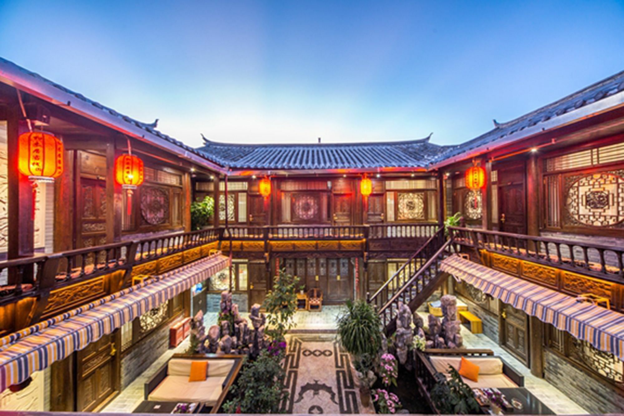 He Mu Ju Inn Zhongyi Branch Lệ Giang Ngoại thất bức ảnh
